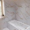 Фото в интерьере Cube Ceramica Calacatta